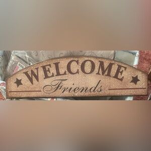 Welcome friends wooden sign.